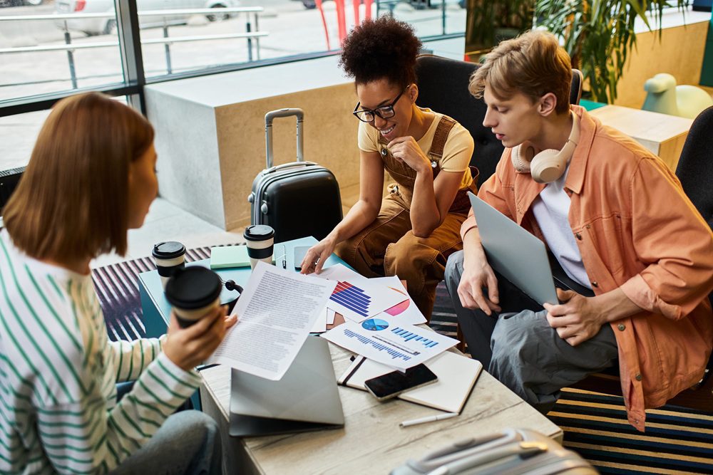 Group of corporate travelers making plans