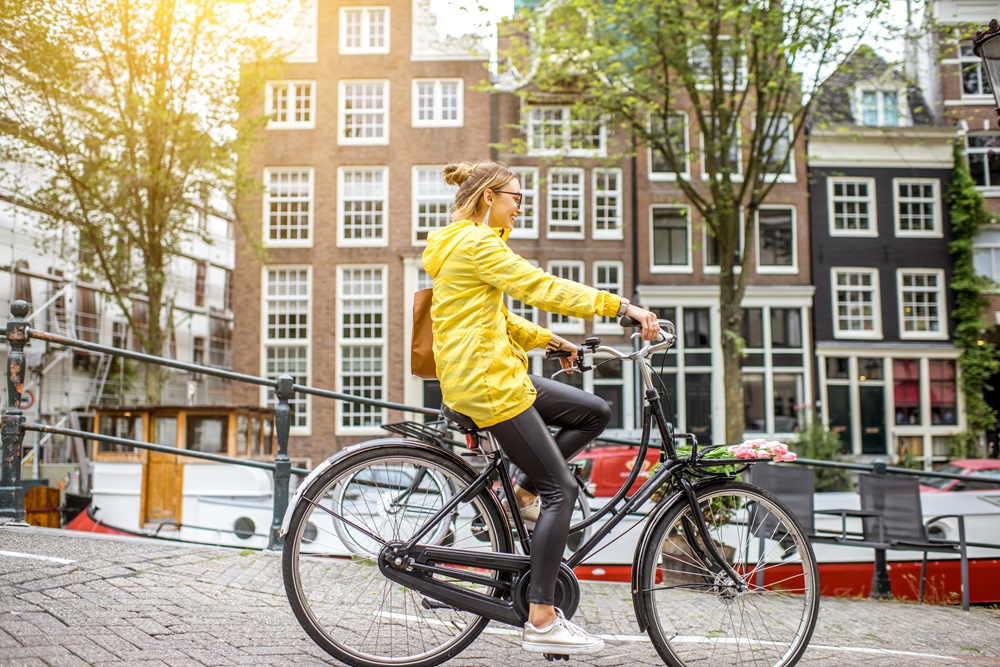 Girl riding bike in Amsterdam