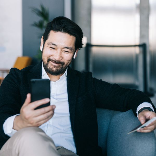Business traveler reserving flight