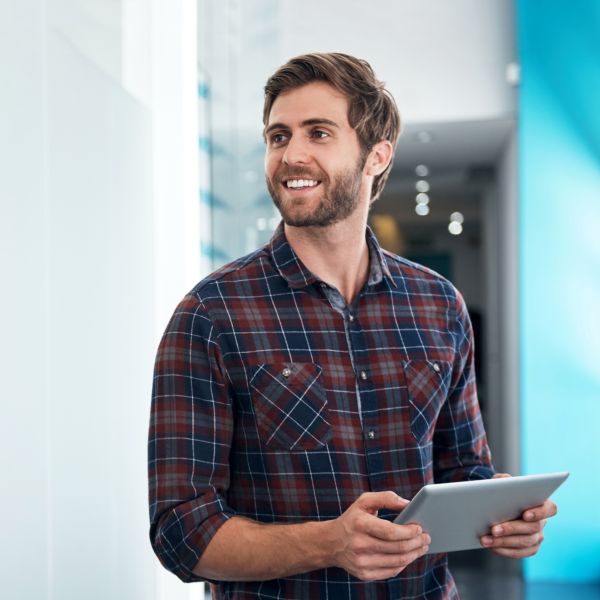 Finance Manager with tablet in office