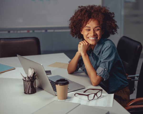 Young woman smiling at workplace