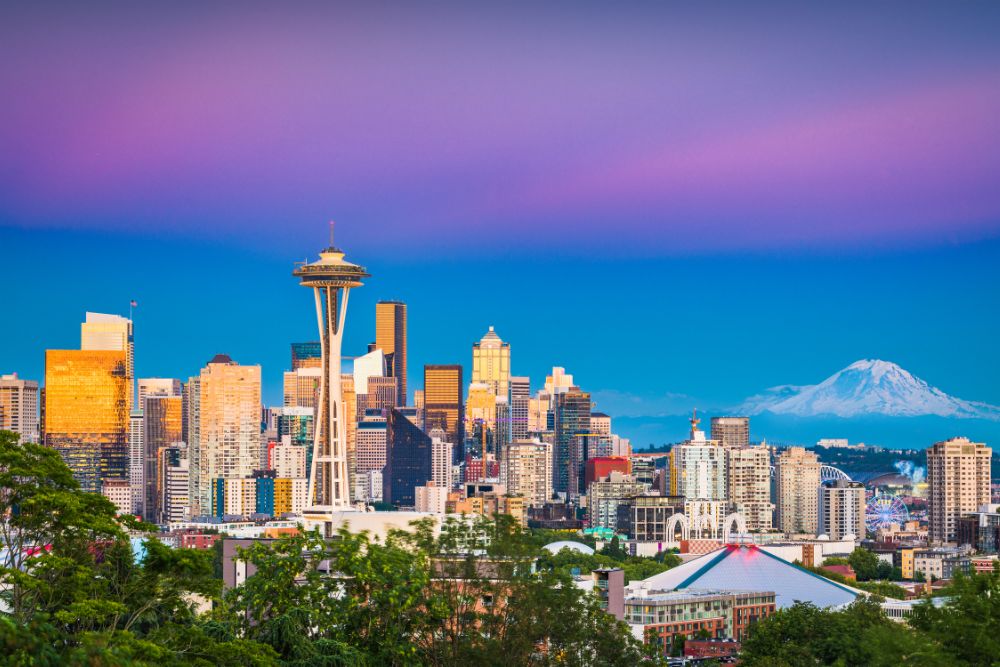 Seattle skyline with Mount Ranier in the background business travel destinations seattle