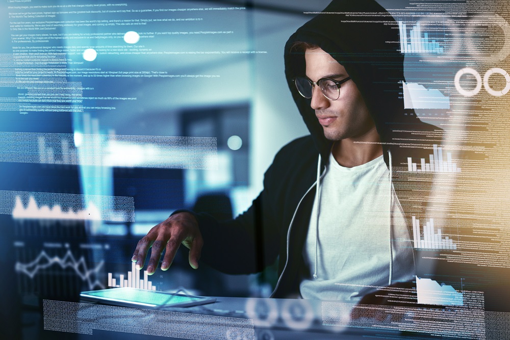 Hacker carrying out cyber breach 