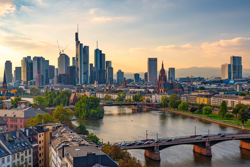 View of Frankfurt skyline and river at sunset