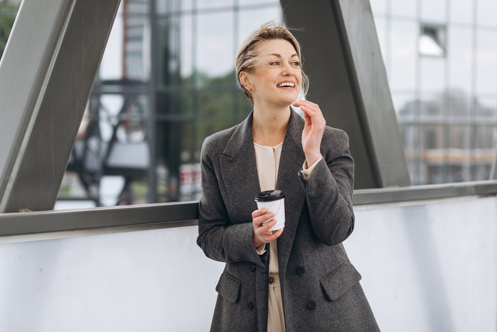 Business woman with coffee on business trip