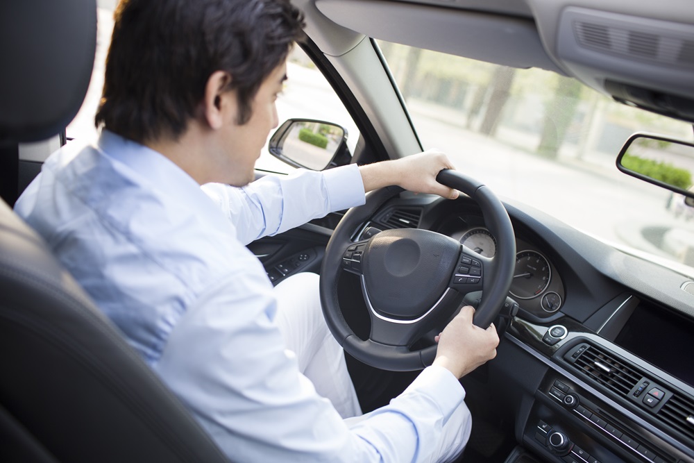 Businessman driving to meeting