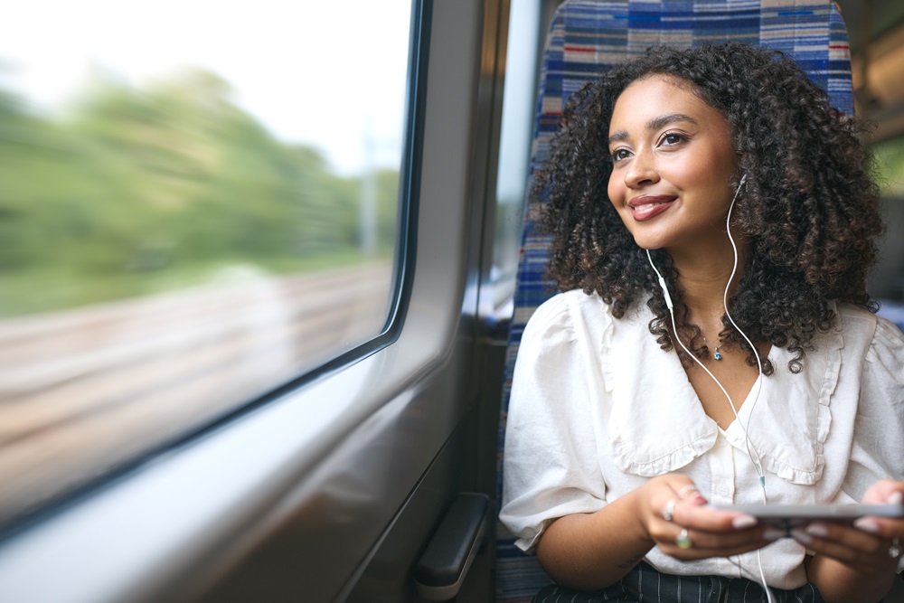 Business woman traveling by TGV train in France
