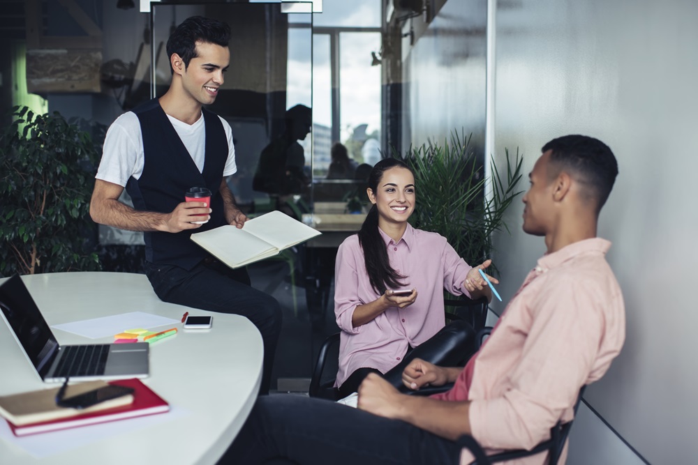 group of colleagues working together to simplify T&E processes
