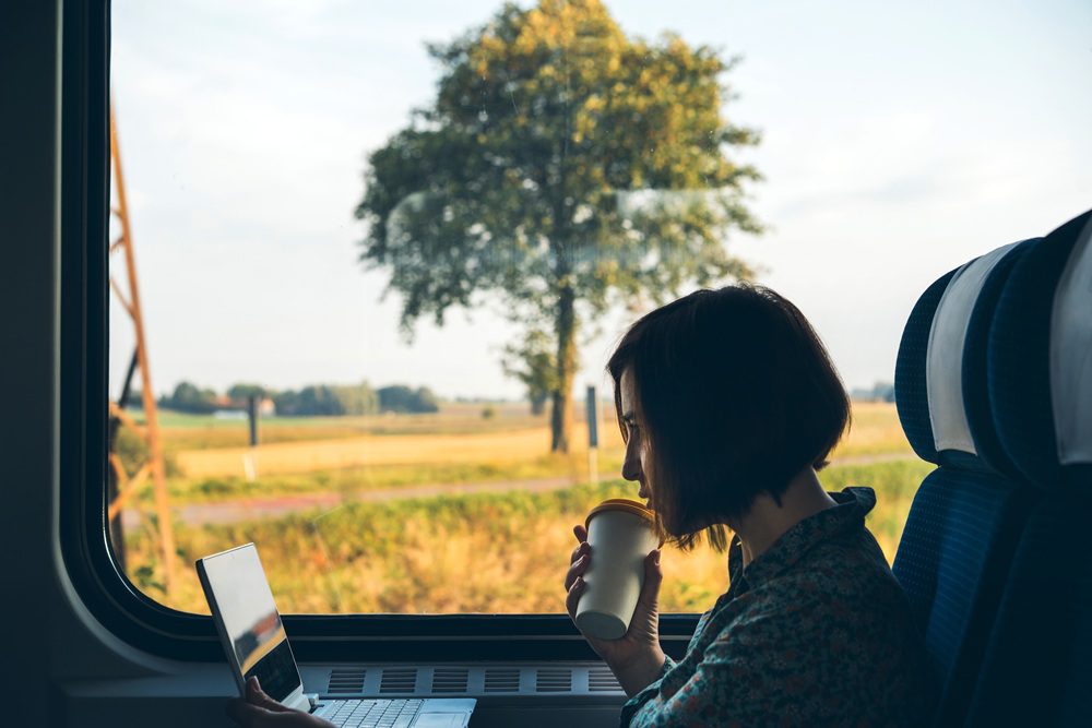 Business traveler working from the train