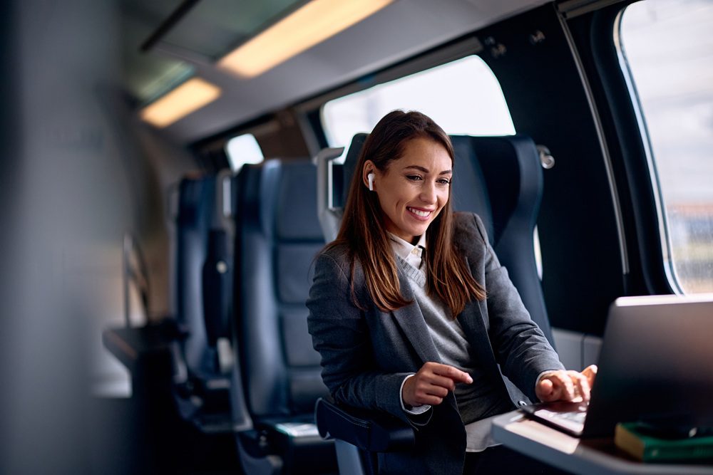 Woman traveling for business looking at travel options
